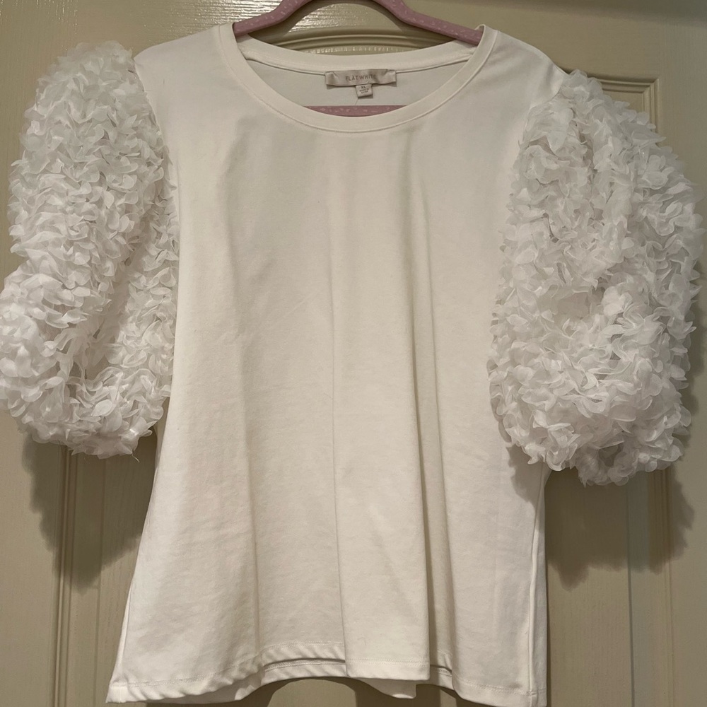 Flat White Top with beautiful puffy sleeves New with Tags